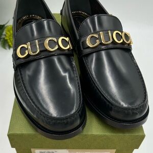 Gucci Men's gold logo embellished Black Loafers. Size 12 1/12
